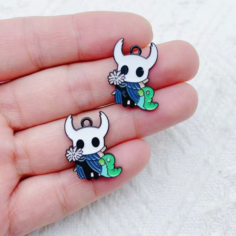 10pcs alloy drip oil cartoon a - Party Games Spy 评论和价格